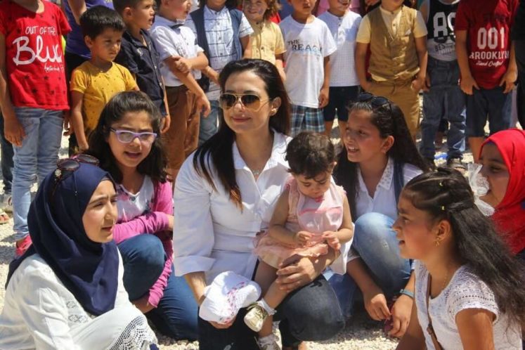 Dilek Özgürgün Suriyeli çocukları sevindirdi